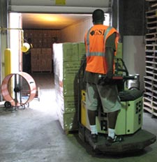 GSI Warehouse worker moving pallet